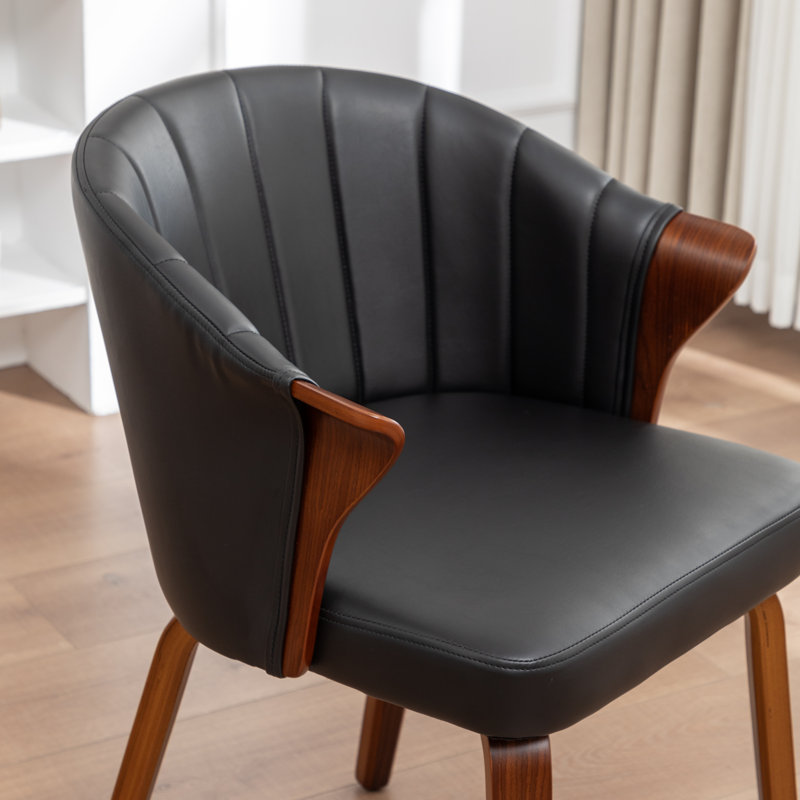Chaise de salle à manger rembourrée en similicuir Devault, Noir