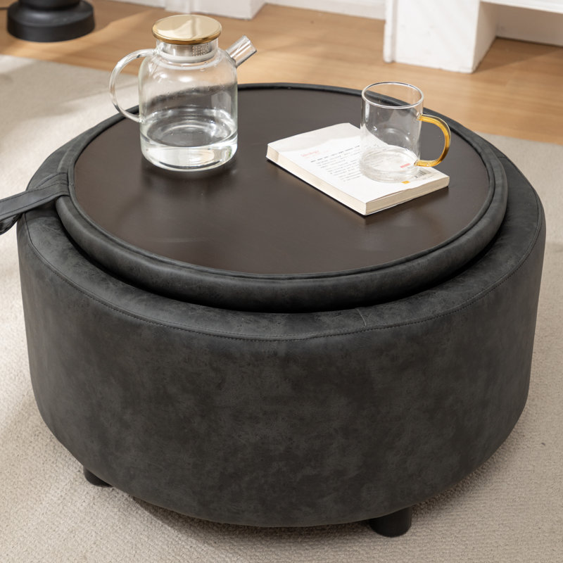 Savinien Upholstered Round Storage Ottoman, Black Performance Faux Leather