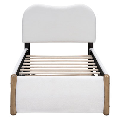 Lit plateforme tapissier confortable avec pieds de soutien en bois et lit gigogne pratique, idéal pour les invités et le décor de la chambre à coucher