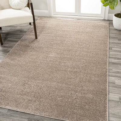 Asami Solid Low-Pile Beige Rug