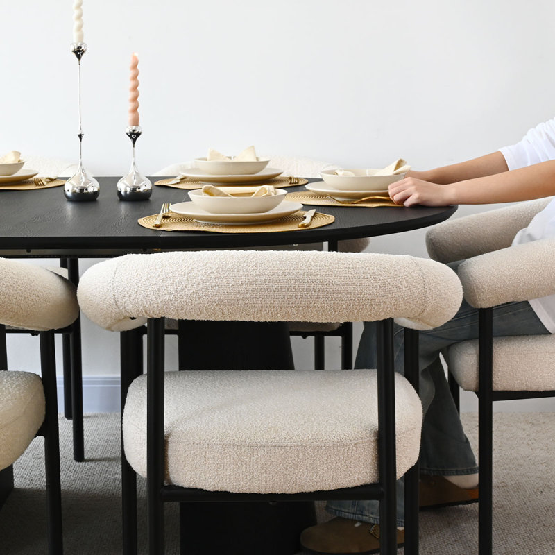 47"–85" Extendable Oval Black Pedestal Dining Table With Bouclé Upholstered Chairs, 7 Pieces: Table, 6 Chairs