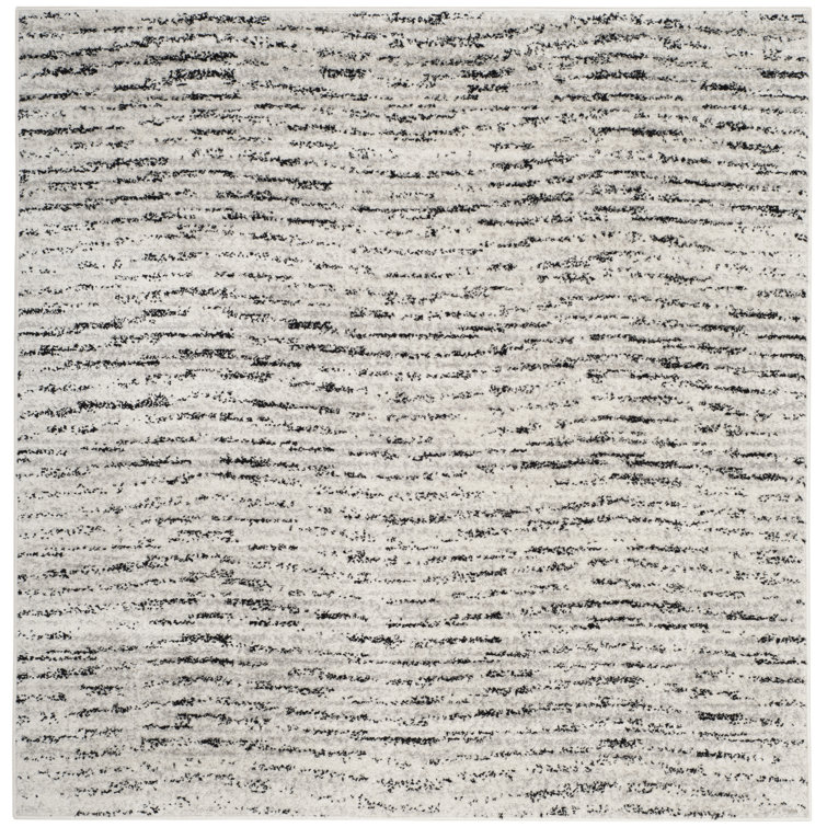 Riebe Abstract Ivory/Silver Area Rug