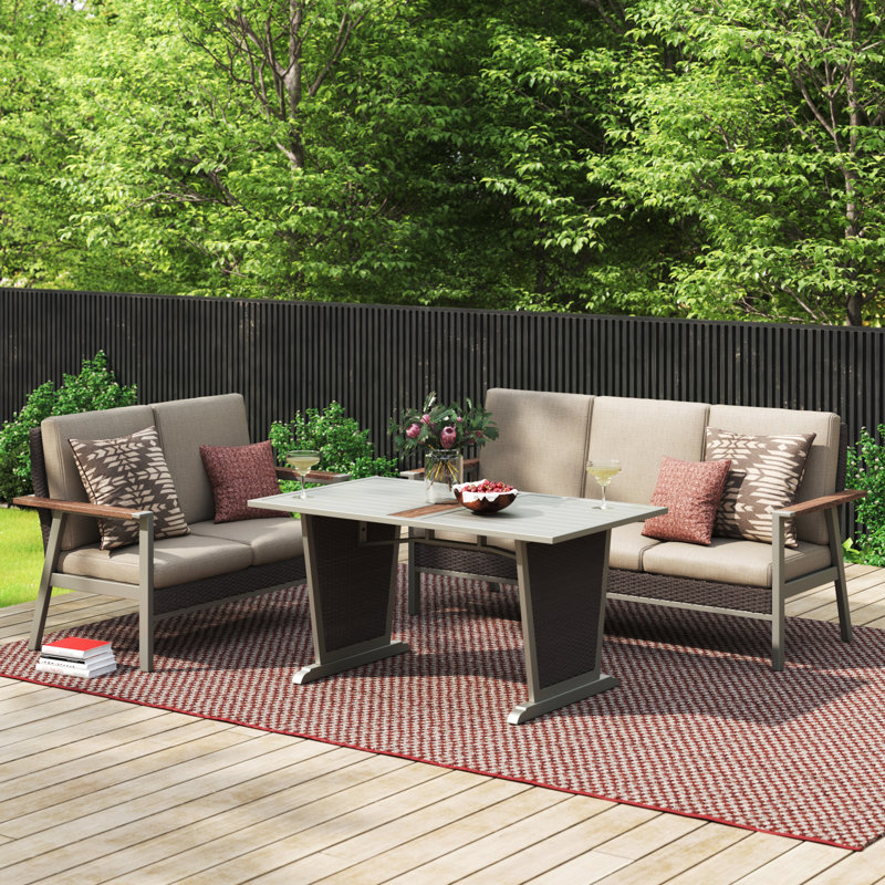 Bertolde 5 - Person Wicker Patio Dining Set with Rectangular Table , Cushions Included