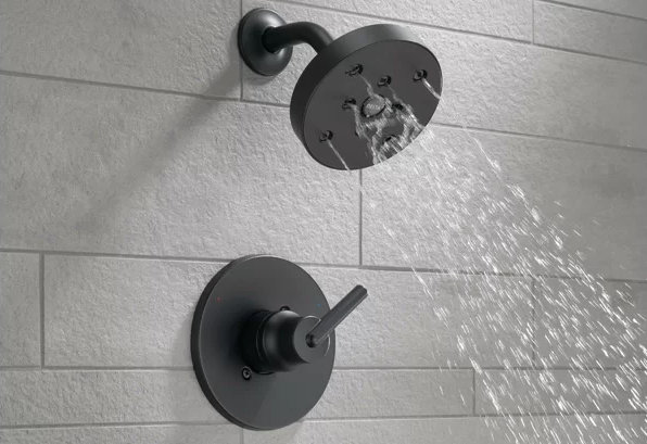 Running shower faucet.