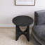 Table basse noire en bois-563889168