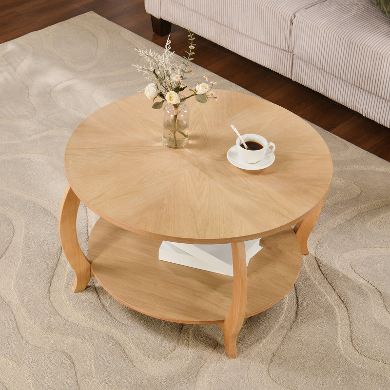 Table basse moderne en forme de tambour avec plateau en grain de bois et pieds réglables