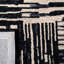 Tapis abstrait en laine / coton touffeté à la main en noir / noir Nouran Drive-2048615303