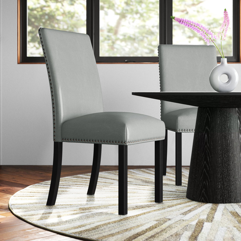 Brezanova 19'' H Faux Leather Upholstered Dining Chair