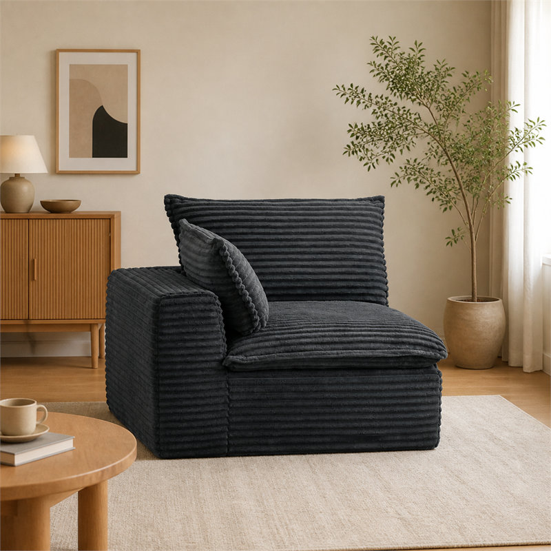 Canapé modulaire composé de mousse grise segmentée et emballé sous vide ; comprend un accoudoir droit permettant une configuration flexible — un fauteuil minimaliste, durable et décontracté, idéal pour le salon.