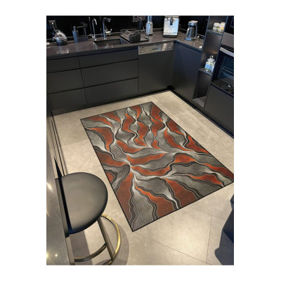Tapis décoratif lavable à motif géométrique brun