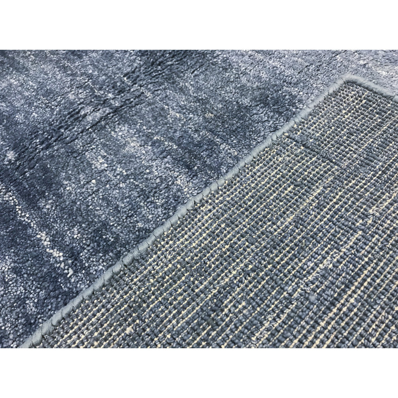 Tapis bleu de haute qualité noué à la main