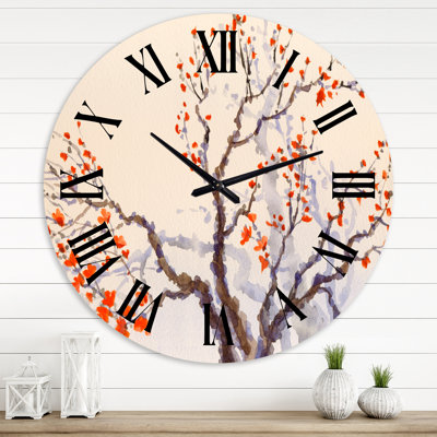 Horloge murale traditionnelle fleurs et bourgeons rouges sur un arbre en fleurs au printemps
