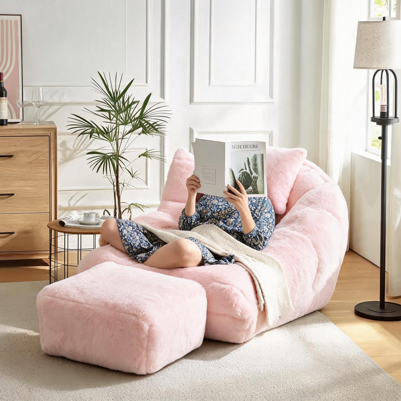 Fauteuil à billes géant en fausse fourrure avec repose-pieds