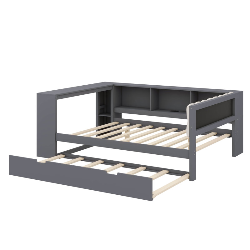 Lit plateforme en bois avec tablettes de rangement intégrées, lit gigogne escamotable, port de chargement USB et tête de lit tapissier
