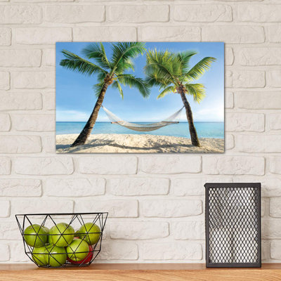Hammock Between Two Palm Trees by Jan Becke - Wrapped Canvas Print