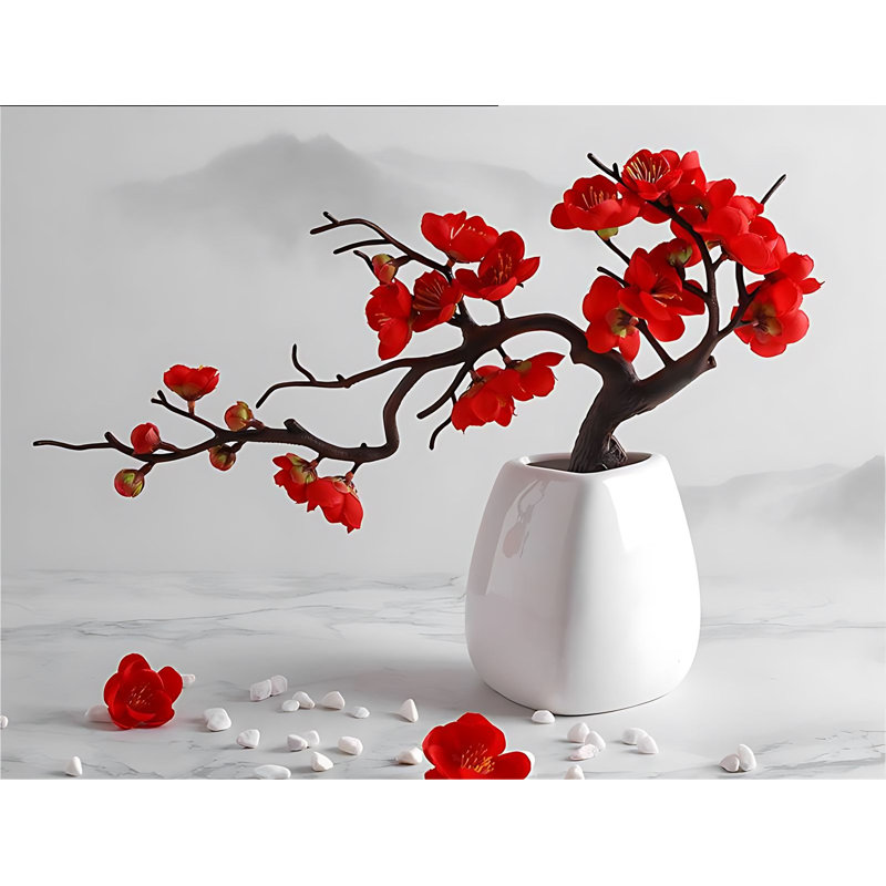 Arrangement de fleurs de prunier en pot