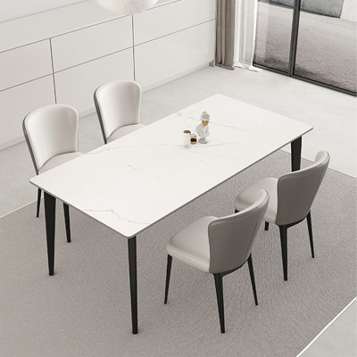 Table de salle à manger blanche et noire en pierre frittée rectangulaire et acier au carbone