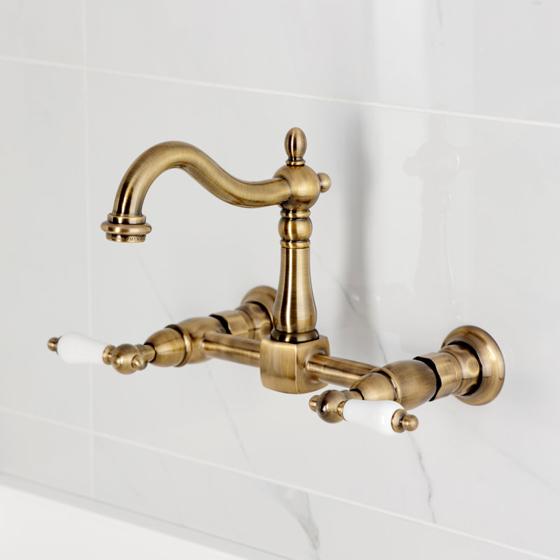 Kingston Brass Heritage Double-Handle 2-Hole Wall-Mount Bridge Kitchen Faucet, Antique Brass