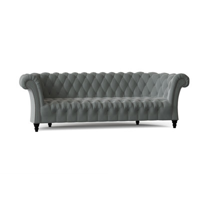 Canapé Chesterfield à accoudoirs roulés
