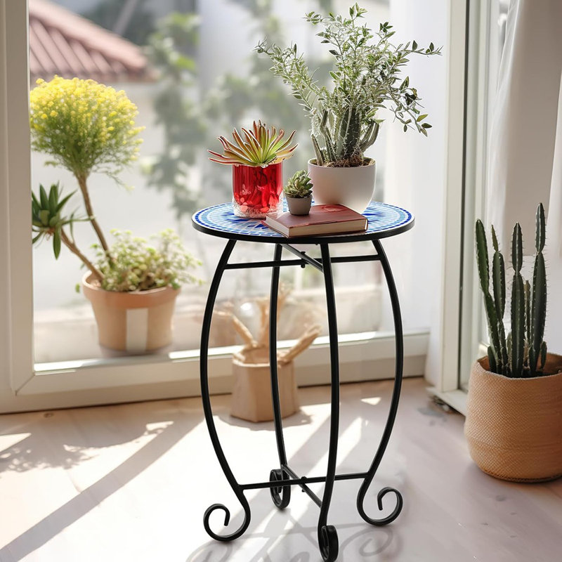 Table d'appoint ronde ronde avec volutes en métal et plateau en céramique