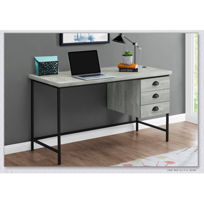 Bureau d'ordinateur moderne avec plateau en stratifié gris et tiroirs de rangement pour une organisation efficace