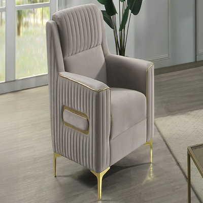 Chaise d'appoint moderne rembourrée avec structure en bois de bouleau massif, assise à ressorts ensachés et pieds en acier inoxydable doré