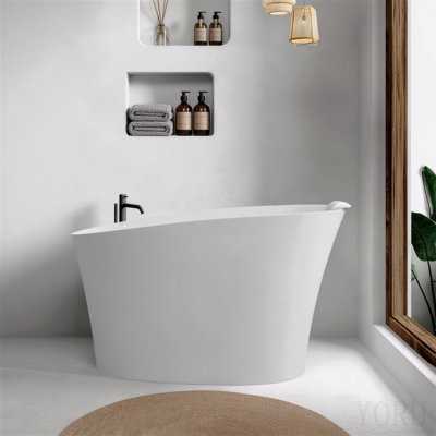 Baignoire autoportante ovale de 51 po à surface solide blanche brillante avec trop-plein et bonde, avec siège et appui-tête intégrés