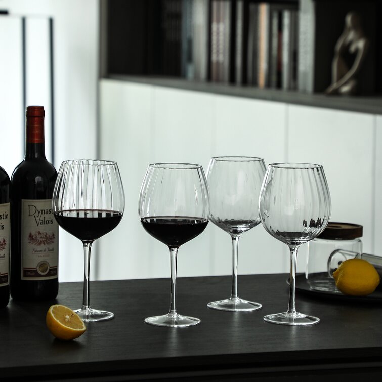 https://assets.wfcdn.com/im/88895256/resize-h755-w755%5Ecompr-r85/1656/165655687/Mikles+Ribbed+23+oz.+Red+Wine+Glass.jpg