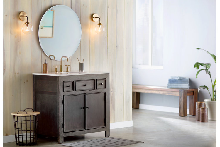 bathroom with hanging mirror and lights