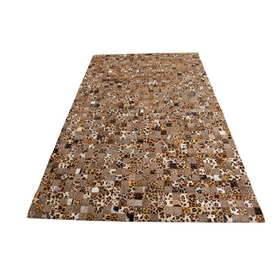 Nivens Light Brown Rug