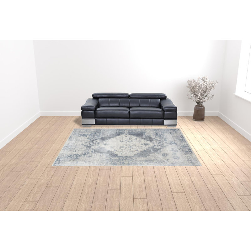 Tapis oriental bleu et ivoire tissé à la machine 9 pi x 12 pi