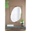 Exquis miroir ovale avec cadre en métal glamour pour une décoration polyvalente