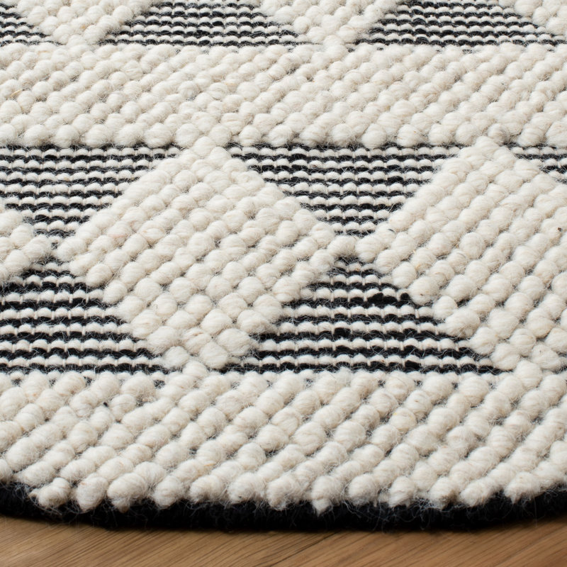 Handmade Black and Ivory Geometric Wool Area Rug