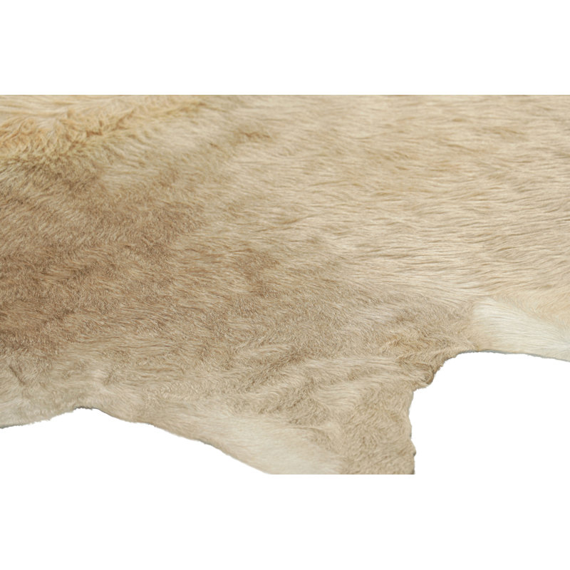 Rug & Kilim’S Large Cowhide Rug In Beige-Brown And Cream Tones