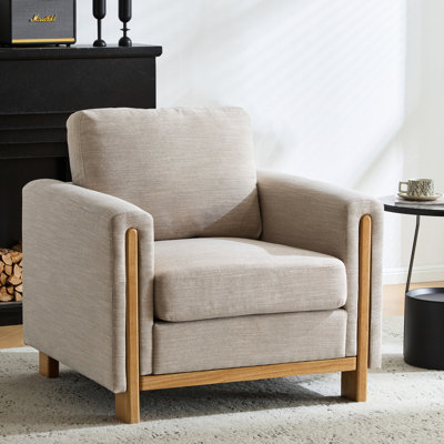 Fauteuil confortable avec revêtement en tissu, structure en bois d'hévéa, dossier à coussins, accoudoirs carrés, couleur anthracite, 90 cm de large, 86 cm de profondeur, hauteur idéale pour un salon. Soutien apparent élégant.