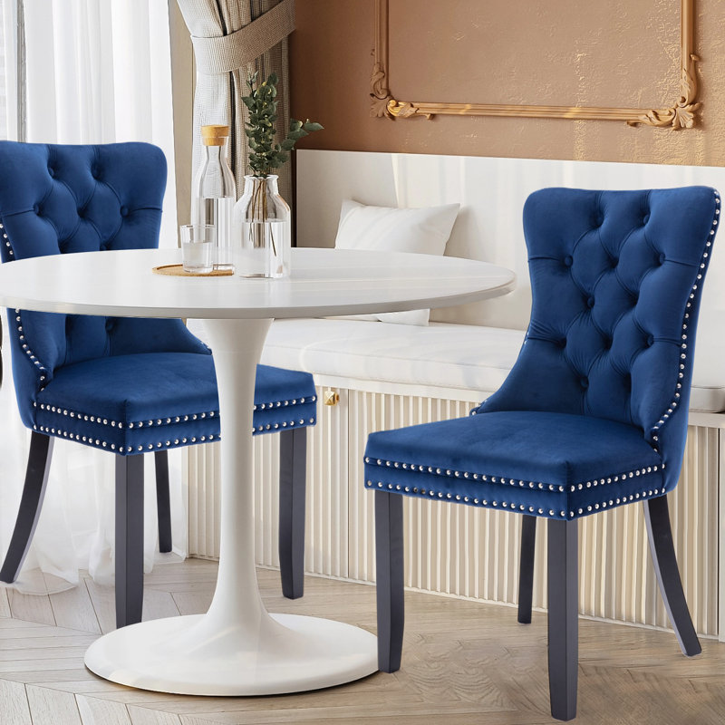 Chaise de salle à manger en velours avec pieds en bois massif Friedrun, Bleu