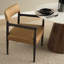 Chaise de salle à manger Sussane avec structure en bois d'ortie brun foncé et revêtement en cuir véritable châtaignier