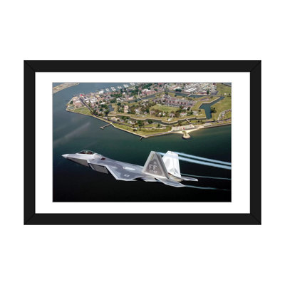 " F/A-22 Raptor Flies Over Fort Monroe " by Stocktrek Images