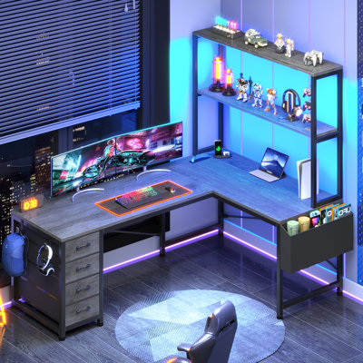 L Shaped Gaming Desk with 4 Storage Drawers and Power Outlet, Reversible Corner Computer Desk for Home Office Dual Monitor Workstation, Gray