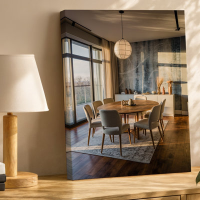 Canvas A Contemporary Dining Room Featuring A Large Round Wooden Table Wall Art Surrounded By Elegantly Upholstered Chairs In Soft Canvas Wall Art
