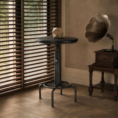 Table de bar ronde à hauteur réglable en tuyaux industriels, style pub/bistro vintage avec plateau en bois, structure en métal argenté brossé et repose-pieds, idéale pour le bar, la cuisine et la salle à manger.
