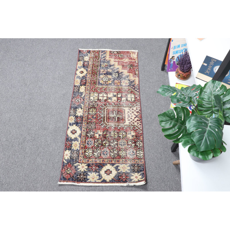 Handmade Vintage Turkish Area Rug With Rich Red and Blue Floral Design Featuring Unique Geometric Patterns Ideal for Any Space