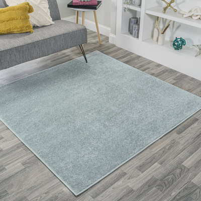 Arzel Solid Low-Pile Aqua Blue Rug