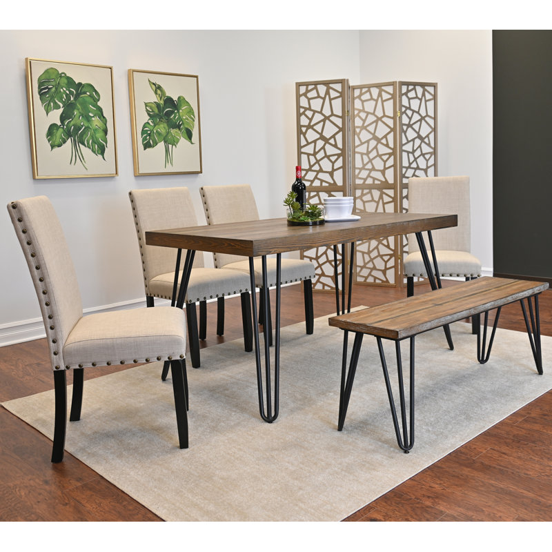 Ensemble de table de salle à manger six pièces pour les réunions de famille, idéal pour les espaces compacts avec un design moderne et des sièges confortables