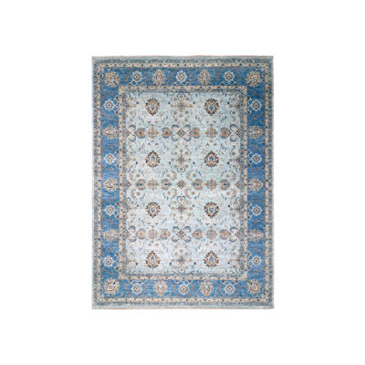 Tapis oriental rectangulaire bleu en laine noué à la main 9 pi 10 po x 13 pi 9 po