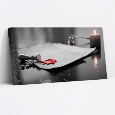 Red Wax Seal Stamp and Candle on Dark Surface Canvas Wall Art