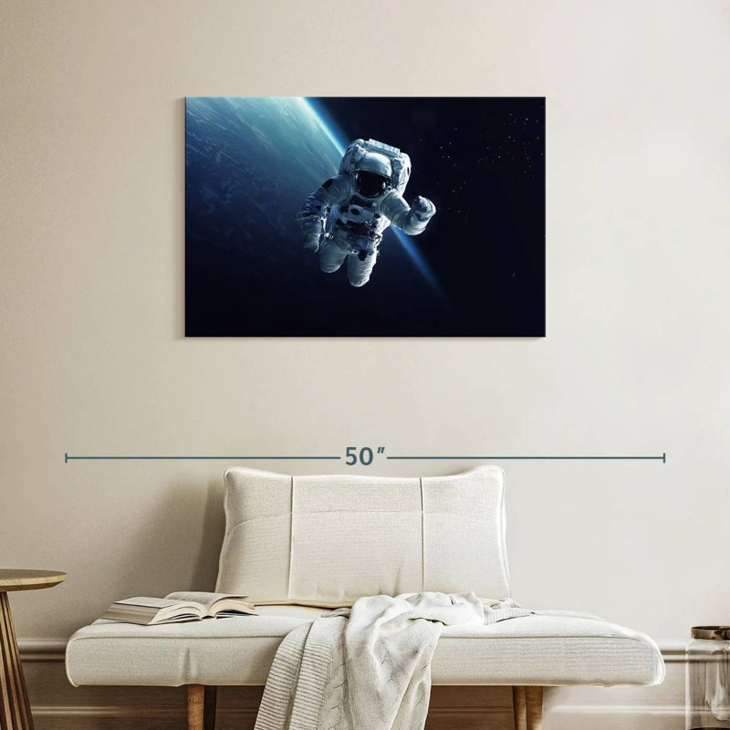 Un astronaute d'Oberle flottant dans l'espace, H 24 po x l 36 po