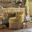 Tabouret de coiffeuse doré capitonné