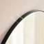 Miroir mural ovale en métal noir-878369795