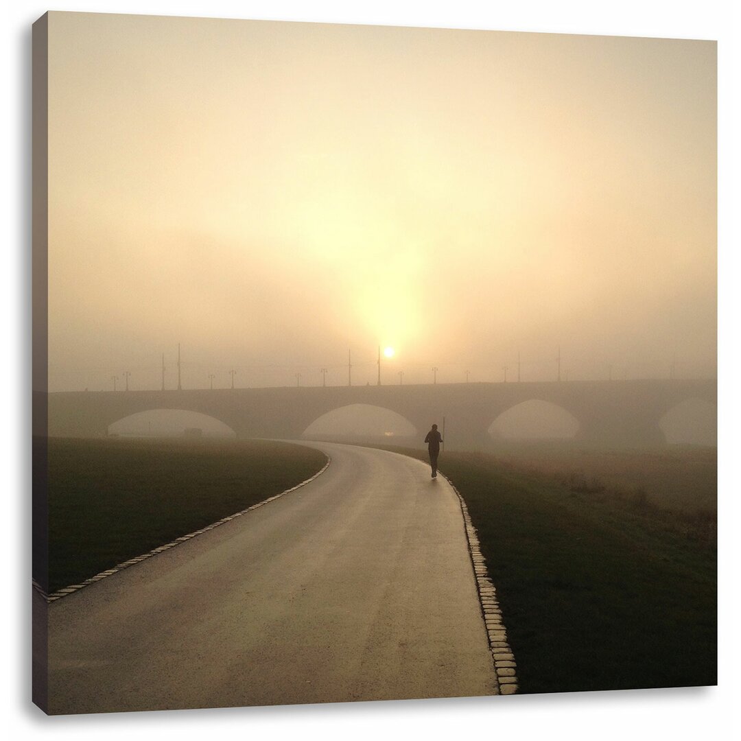 Leinwandbild Laufen im Morgengrauen